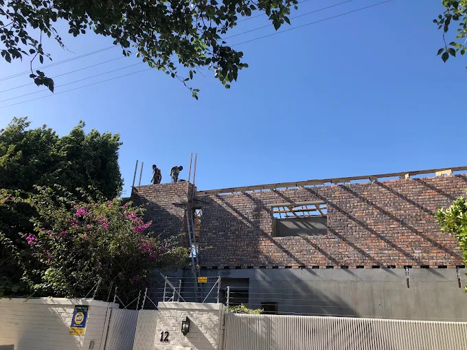 Roof timbers set out across the new upper storey