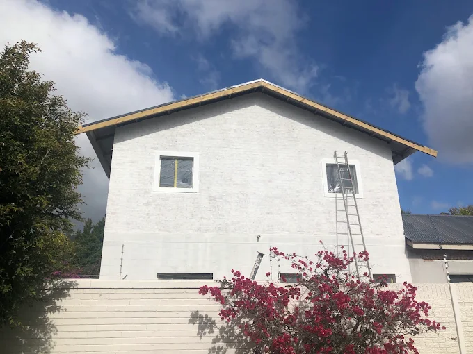 The finished second storey, plastered, painted and roofed